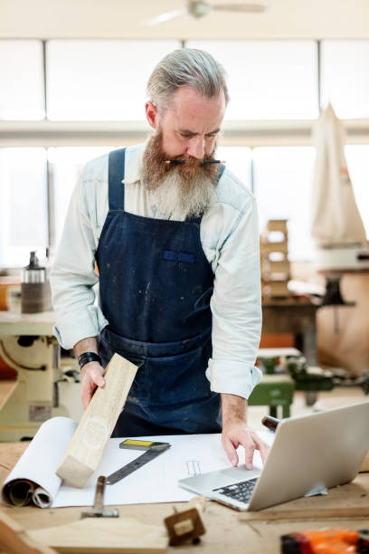 istock Carpenter Craftsman Handicraft Wooden Workshop Concept 814804372