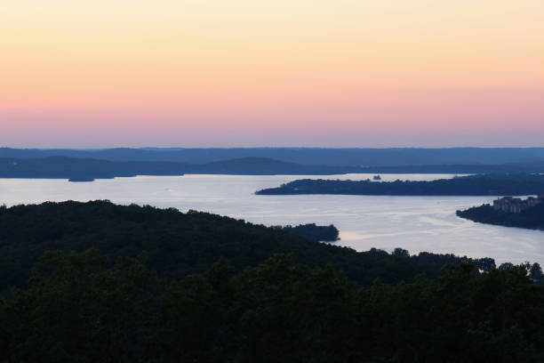 Table Rock Lake Sunset over Table Rock Lake viewed from Big Cedar Lodge near Branson, MO. springfield missouri photos stock pictures, royalty-free photos & images