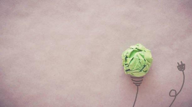 istock unplugged green paper light bulb, eco energy saving concept 814832094