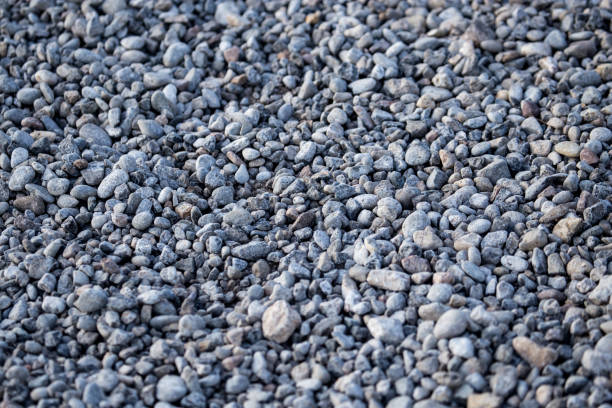 istock Crushed stone on the road as a background 814834116