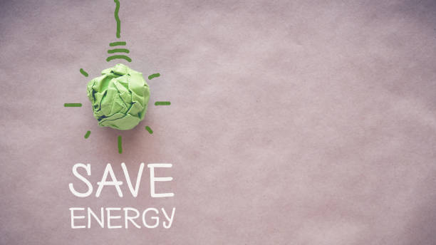 istock Green paper light bulb, eco energy saving concept 814838194