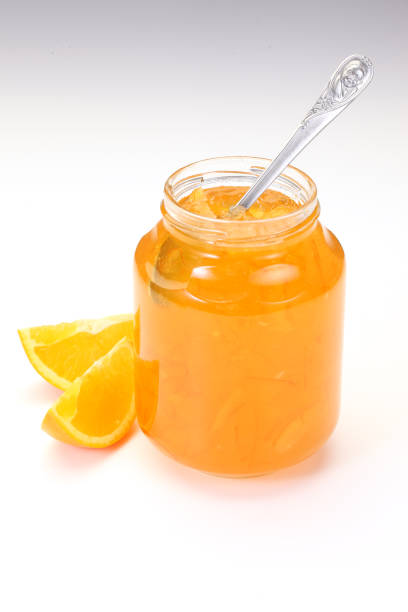 jar 의 잼 - gelatin dessert orange fruit marmalade 뉴스 사진 이미지