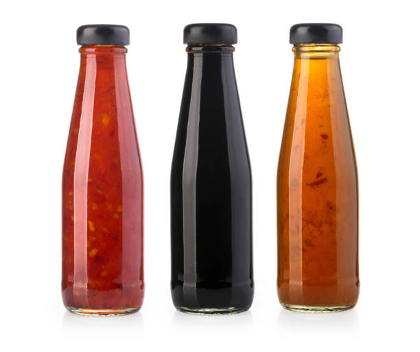 istock the various barbecue sauces in glass bottles 814909012