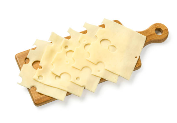 fette di formaggio su tavola di legno - swiss cheese foto e immagini stock