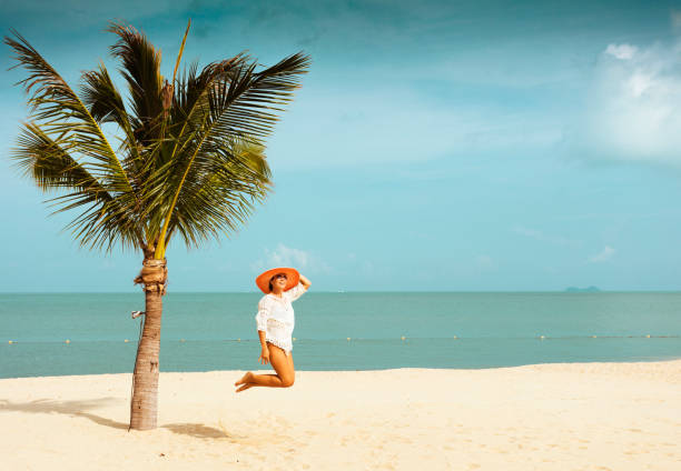 istock Woman at tropical beach 814926022