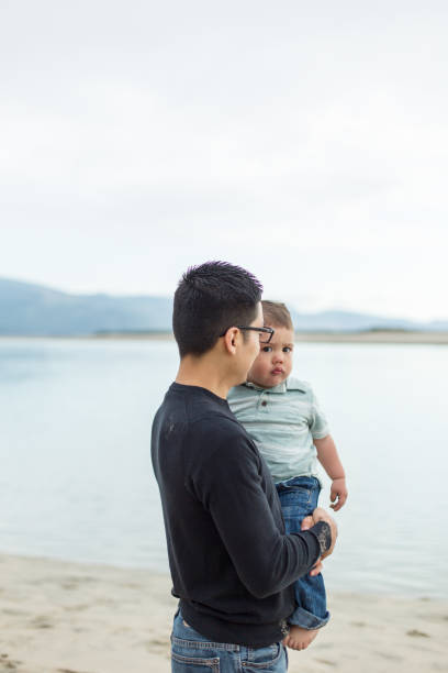 istock Family day at the beach 814928220