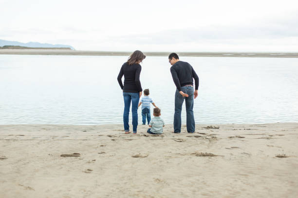 istock Family day at the beach 814928234