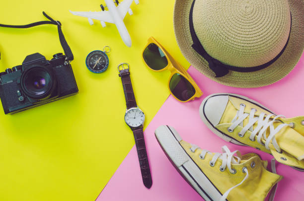 istock Clothing accessories for summer on multicolor paper floor - concept lifestyle 814928796