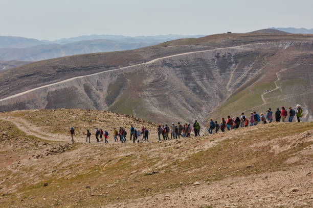 Free Stock Photo of Group of People Walking Down a Dirt Road | Download ...