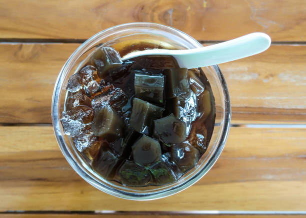 istock Grass jelly, Thai dessert on wood background 814953714