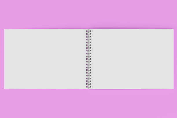 istock Open blank white notebook with metal spiral bound on violet background 814956438