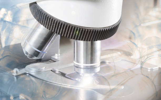 istock close up shot of microscope at the blood laboratory and empty capsules 814969300