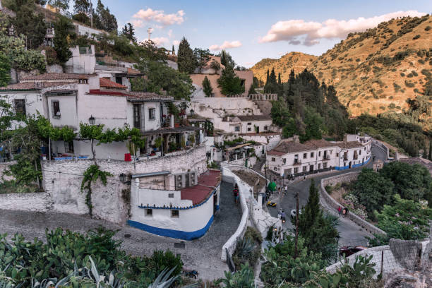 Walking in the streets in the afternoon. Cave houses