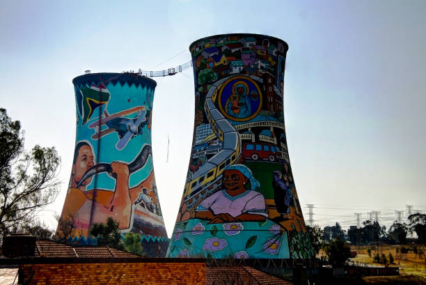 Former powerplant, cooling tower, now is place for BASE jumping Former powerplant, cooling tower, now is tower for BASE jumping - 25-08-2013, johannesburg. South Africa soweto stock pictures, royalty-free photos & images