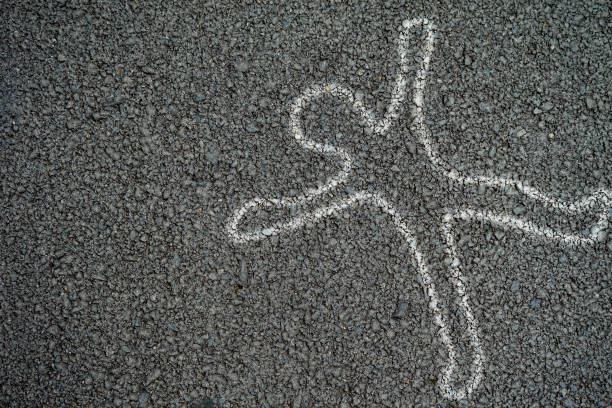 white outline of human body at the accident on the road - crime scene chalk outline crime murder imagens e fotografias de stock