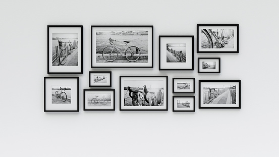 Photo frame on wall - pic bicycle (3d rendering)