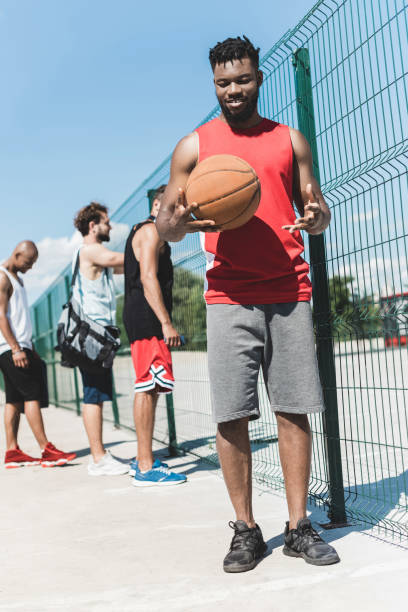 istock multicultural basketball team spending time on basketball court 814996032