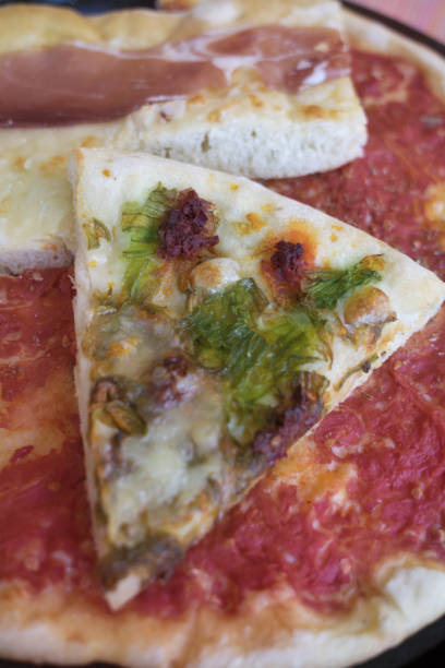 istock pizza with zucchini flowers 814996324
