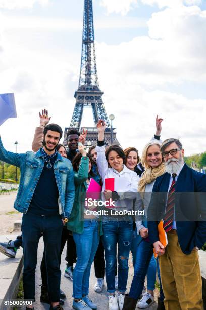 Group Of Students And Teacher On A School Trip To Paris Stock Photo - Download Image Now