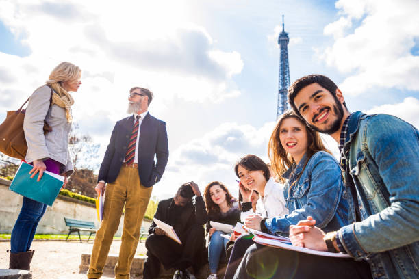 istock Group of students and teacher on a school trip to Paris 815000902