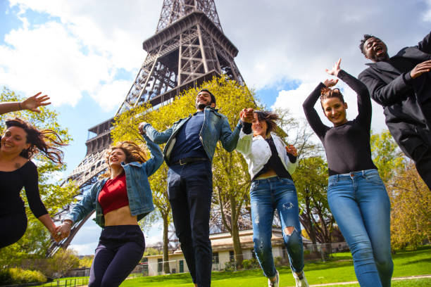 istock Group of students and teacher on a school trip to Paris 815000960