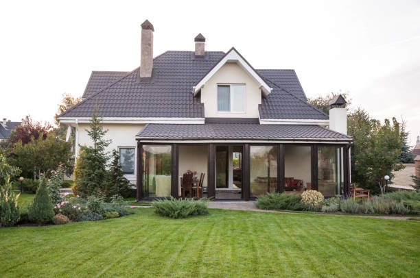 istock Private house with a garden in a rural area under sky 815001010