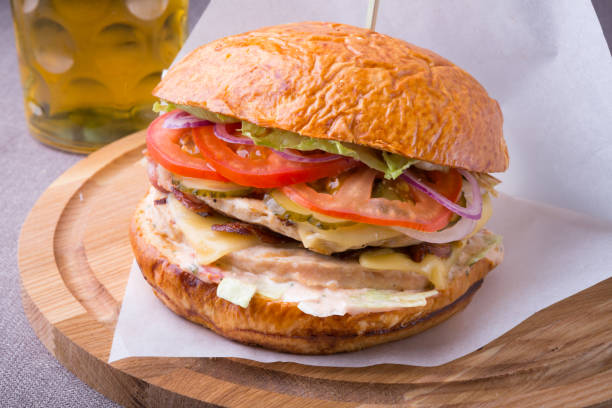istock Hamburger on a wooden board 815025838