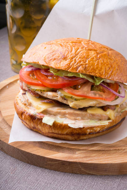 istock Hamburger on a wooden board 815025842