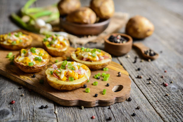 istock Potato boats filled with corn, ham, cheese and green onion 815028818