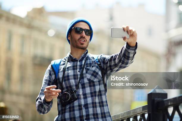 Tourist Making Selfie Stock Photo - Download Image Now - Adult, Adventure, Backpack