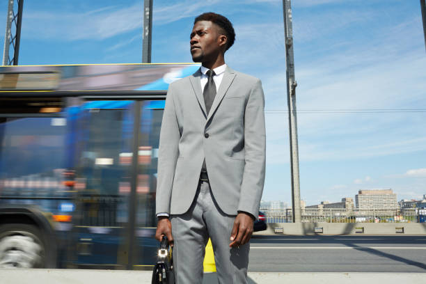 istock Businessman by road 815039220