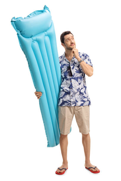 istock Pensive tourist with an air mattress 815040316