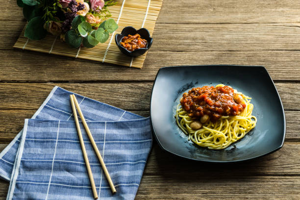 istock Spaghetti pasta with sausage and tomato sauce 815047806