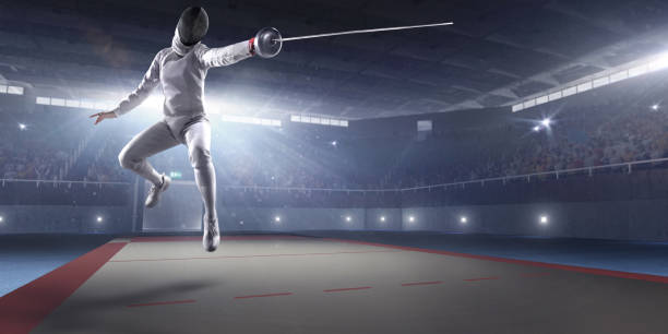 Fencing competition. Female fencer fight on big professional stage. She is wearing an unbranded fencing suit.