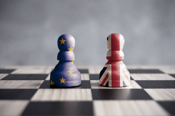 Brexit strategy concept Two chess pawns with UK and European flags pawn chess piece photos stock pictures, royalty-free photos & images