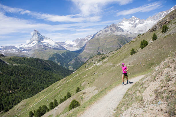 istock Fit female running outdoors 815069292