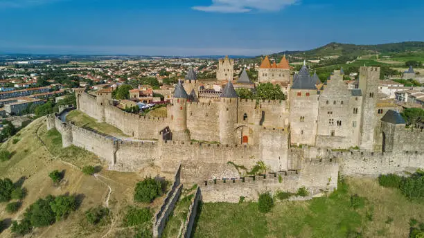 Photo of Aerial top view of Carcassonne medieval city and fortress from above, Sourthern France