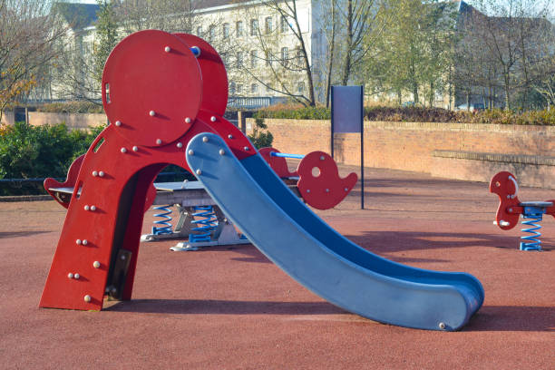 istock Children playground blue-red slider for kids 815074146