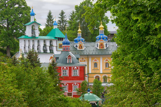 Pskov-Caves Monastery or The Pskovo-Pechersky Dormition Monastery Pskov-Caves Monastery or The Pskovo-Pechersky Dormition Monastery on summer, Russia pskov russia stock pictures, royalty-free photos & images