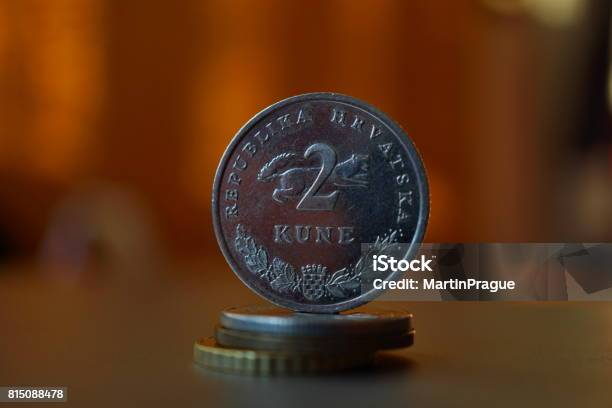 Macro Detail Of A Metal Croatian Coin On The Top Of Column Created Of Coins With A Positive Colorful Warm Background Stock Photo - Download Image Now