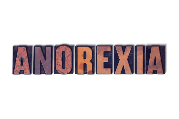 anorexia concept isolated letterpress word - undernourishment imagens e fotografias de stock