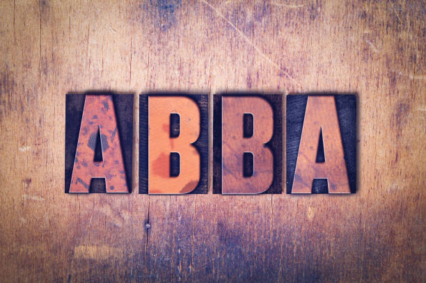 The word ABBA concept and theme written in vintage wooden letterpress type on a grunge background.