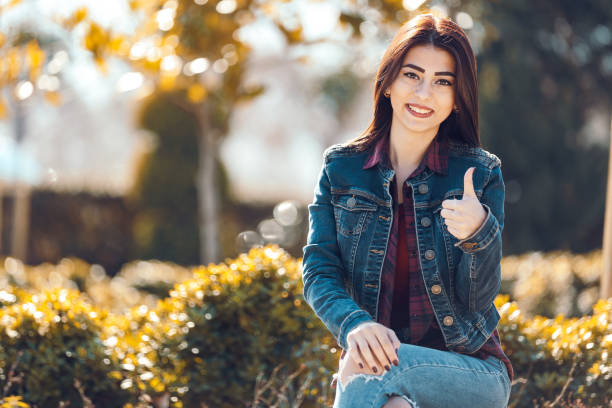 istock The girl is sitting the park 815111530
