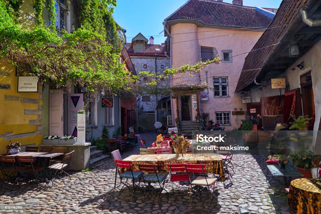 Courtyard in historic center in Tallinn Courtyard of the masters in the historic center in a summer sunny day Tallinn, Estonia Tallinn Stock Photo