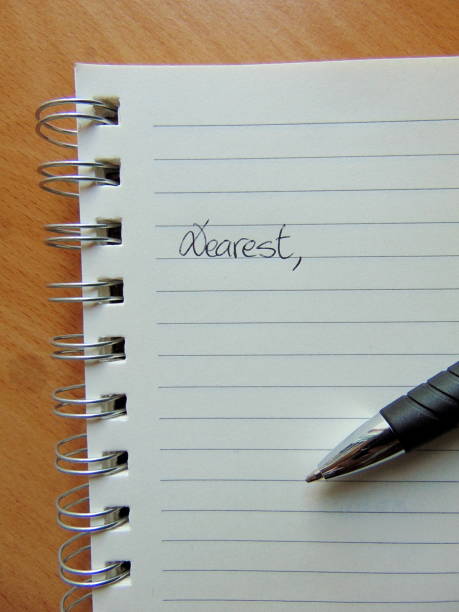 istock Writing a letter on lined paper starting with Dearest, 815165814