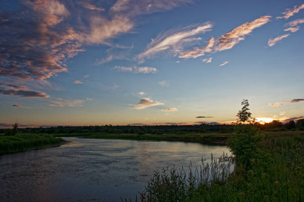 istock Sunset over the River in July. 815174840
