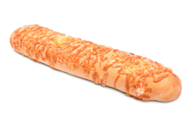 istock Rustic bread with processed cheese, isolated on a white background. Fresh and delicious cheese baguette. Bakery products. Freshly baked bread. 815175422