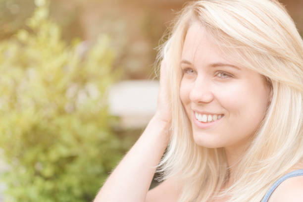 istock Attractive girl in hazy summer sun 815180262