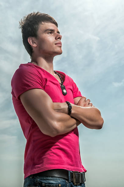 istock Handsome good-looking man on beach smiling during vacation in holiday resort. 815180284