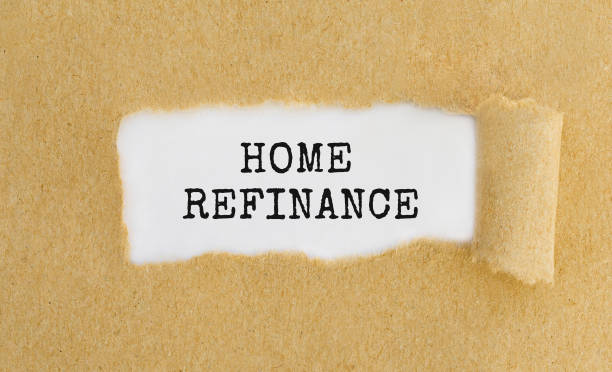 istock Text Home Refinance appearing behind ripped brown paper 815185814
